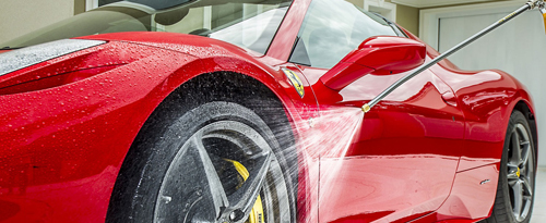 Red ferarri car washed using Power Jet